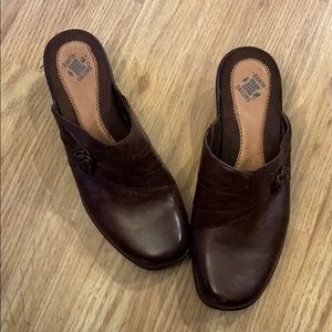 Brown leather clogs by Earth Origins.